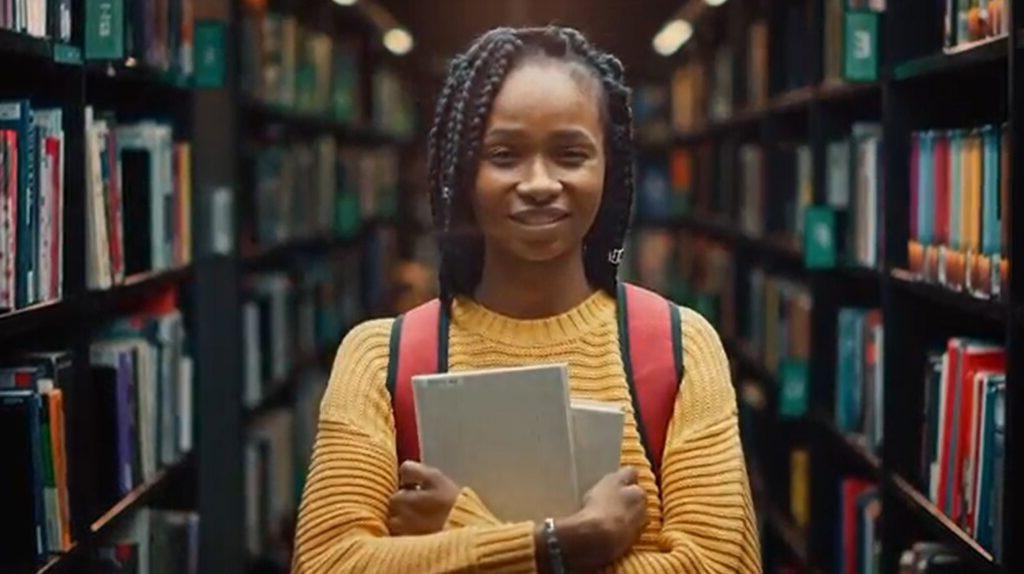 young woman in library